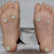 Stehfähigkeit mit Bolzen in den Fußsohlen